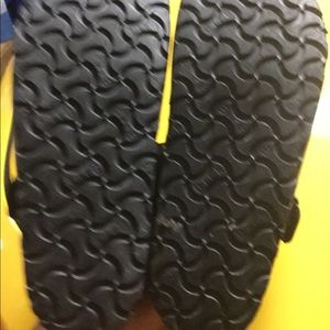 Birkenstock’s gray patent leather nursing shoes.